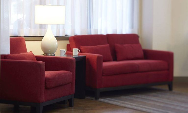 The hotel’s lobby offers comfortable seating for guests to relax.