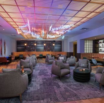 The Rhapsody Room is a lounge for social and corporate events, with comfy seating and coffee tables aplenty.