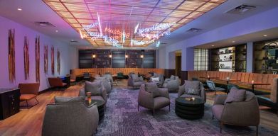 The Rhapsody Room is a lounge for social and corporate events, with comfy seating and coffee tables aplenty.