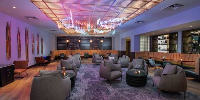 The Rhapsody Room is a lounge for social and corporate events, with comfy seating and coffee tables aplenty.