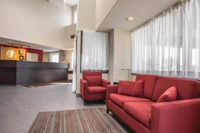 The hotel’s lobby has comfortable seating for guests to socialize and relax.