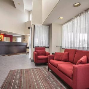 The hotel’s lobby has comfortable seating for guests to socialize and relax.