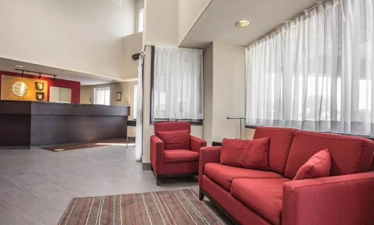 The hotel’s lobby has comfortable seating for guests to socialize and relax.