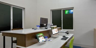 Equipped business center with PC, internet, work space, and printer at Holiday Inn Express & Suites Ontario.