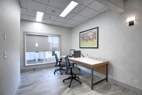 Dedicated business center with PC, internet, printer, and work space at Holiday Inn Express & Suites Airport-Calgary.