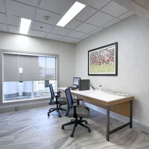 Dedicated business center with PC, internet, printer, and work space at Holiday Inn Express & Suites Airport-Calgary.