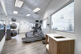 Well equipped fitness center at Holiday Inn Express & Suites Airport-Calgary.