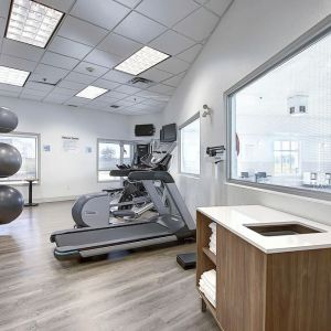 Well equipped fitness center at Holiday Inn Express & Suites Airport-Calgary.