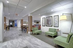 Comfortable lobby and coworking space at Holiday Inn Express & Suites Airport-Calgary.