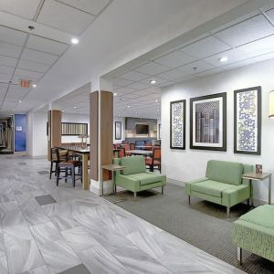 Comfortable lobby and coworking space at Holiday Inn Express & Suites Airport-Calgary.