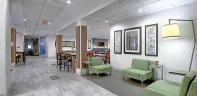 Comfortable lobby and coworking space at Holiday Inn Express & Suites Airport-Calgary.