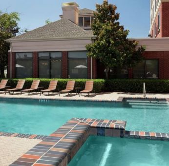 Relaxing outdoor pool at Hilton Garden Inn Dallas/Allen.