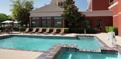 Relaxing outdoor pool at Hilton Garden Inn Dallas/Allen.