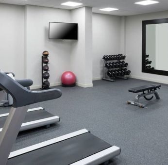 Equipped fitness center at Hilton Garden Inn Dallas/Allen.