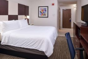 Delux king bed with TV and business desk at Holiday Inn Express Towson Baltimore N.