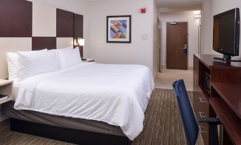 Delux king bed with TV and business desk at Holiday Inn Express Towson Baltimore N.