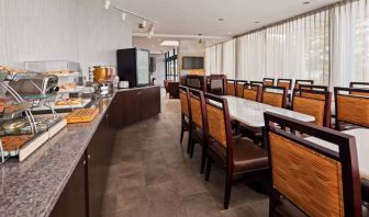 Best Western Braintree’s breakfast area has a hard floor, large windows, and plenty of tables.