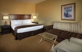 Delux king bed with business desk at Doubletree Hotel Chicago O'Hare Airport-Rosemont.