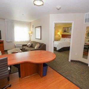 Guest room in Candlewood Suites Boise, with a workspace desk and chair.