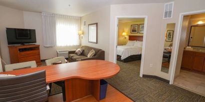 Guest room in Candlewood Suites Boise, with a workspace desk and chair.