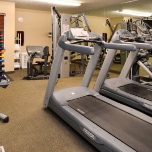 The hotel fitness center offers both weights and exercise machines for guests to use.