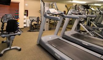 The hotel fitness center offers both weights and exercise machines for guests to use.