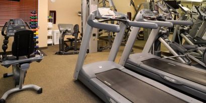 The hotel fitness center offers both weights and exercise machines for guests to use.