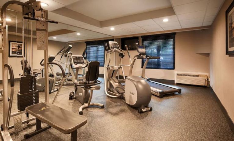 The fitness center has a variety of exercise machines for guests.