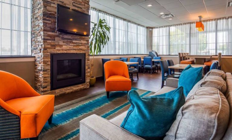 The hotel’s lobby lounge has comfy seating and a widescreen television.