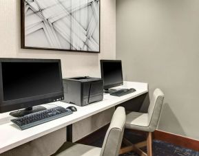 Dedicated business center with PC, internet, and printer at Hyatt Place Denver Airport.