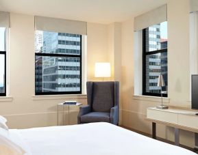 Spacious king bedroom with TV at Hyatt Centric The Loop Chicago.