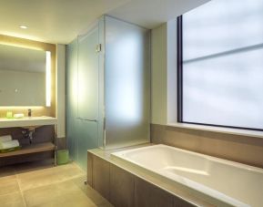 Private guest bathroom with shower at Hyatt Centric The Loop Chicago.
