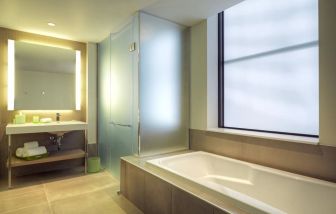 Private guest bathroom with shower at Hyatt Centric The Loop Chicago.