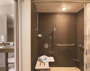 Private guest bathroom with shower at Hyatt House Boston Burlington.