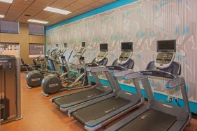 The hotel’s fitness center comes with assorterd exercise machines for guests.