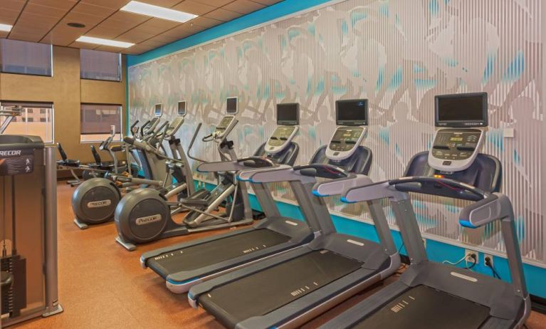 The hotel’s fitness center comes with assorterd exercise machines for guests.