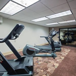 The hotel’s fitness center has racks of weights and numerous exercise machines.