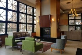 Comfy seats and coffee tables are present in the hotel’s lobby lounge.