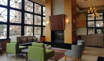 Comfy seats and coffee tables are present in the hotel’s lobby lounge.