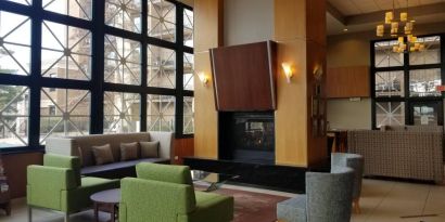 Comfy seats and coffee tables are present in the hotel’s lobby lounge.