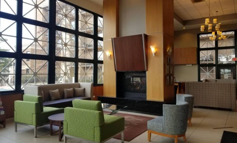 Comfy seats and coffee tables are present in the hotel’s lobby lounge.