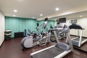 The hotel fitness center, equipped with variety of exercise machines.