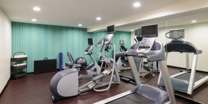 The hotel fitness center, equipped with variety of exercise machines.