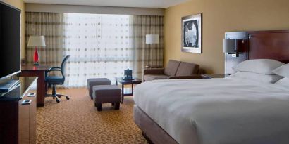 Day use room with work desk and sofa at Houston Marriott South At Hobby Airport.