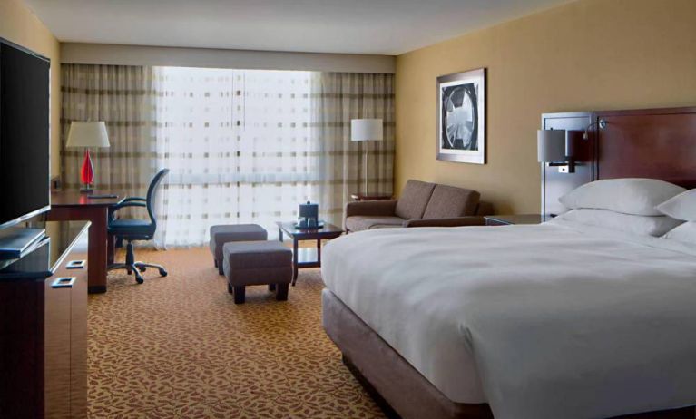 Day use room with work desk and sofa at Houston Marriott South At Hobby Airport.