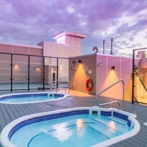 Relaxing rooftop hot tubs at Hotel Clique Calgary Airport.