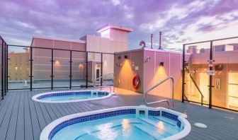 Relaxing rooftop hot tubs at Hotel Clique Calgary Airport.