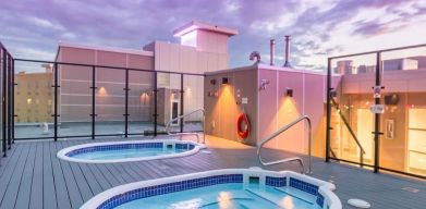 Relaxing rooftop hot tubs at Hotel Clique Calgary Airport.