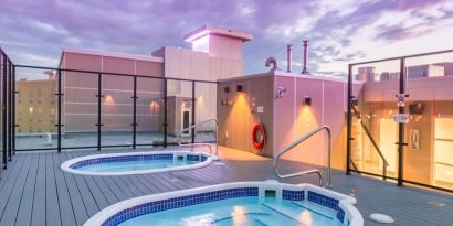 Relaxing rooftop hot tubs at Hotel Clique Calgary Airport.