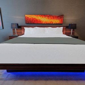 Luxurious and funky style delux king bed at Hotel Clique Calgary Airport.